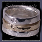 14 karat Yellow Gold, Sterling Silver and Diamond Rolling Ring Wedding Band Image