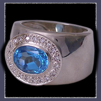 Sterling Silver, Genuine Oval Blue Topaz and Cubic Zirconia Ring Image