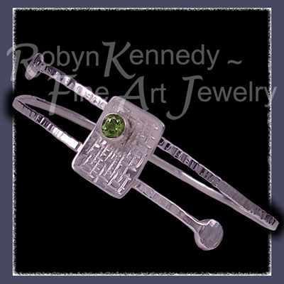 Sterling Silver and Peridot 'Fantasy' Bangle Bracelet Image