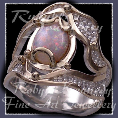 14 Karat Yellow Gold, Sterlium Sterling Silver and A Grade Australian Opal 'Glory' Ring Image
