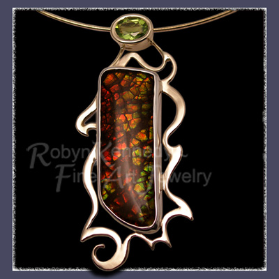 14 Karat Yellow Gold, Sterling Silver and Peridot, One-of-a-Kind 'Green Dragon Pendant / Brooch Image