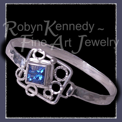 Sterling Silver and Fantasy Cut Glacier Blue Topaz Gemstone 'Ice Capades' Image